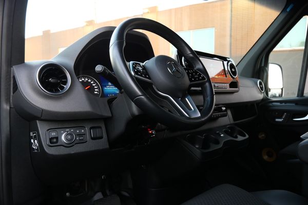 Silver 2022 Mercedes-Benz Sprinter 2500 4x4 custom camper conversion for sale by Sandbox Motors.