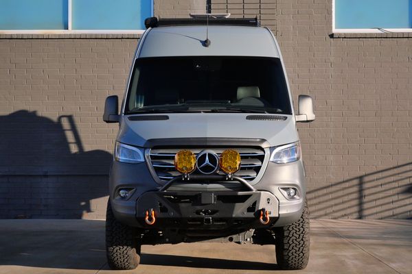 Silver 2022 Mercedes-Benz Sprinter 2500 4x4 custom camper conversion for sale by Sandbox Motors.