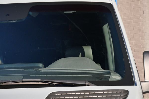 Silver 2022 Mercedes-Benz Sprinter 2500 4x4 custom camper conversion for sale by Sandbox Motors.