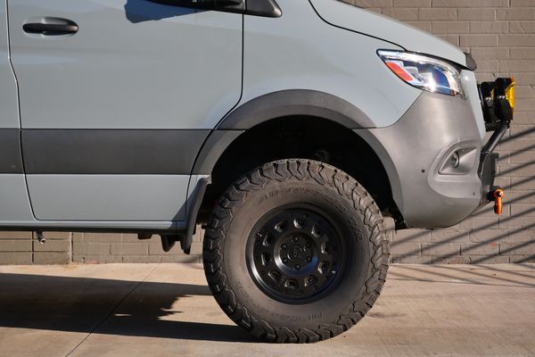 Silver 2022 Mercedes-Benz Sprinter 2500 4x4 custom camper conversion for sale by Sandbox Motors.