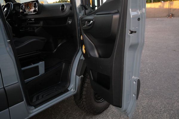 Silver 2022 Mercedes-Benz Sprinter 2500 4x4 custom camper conversion for sale by Sandbox Motors.