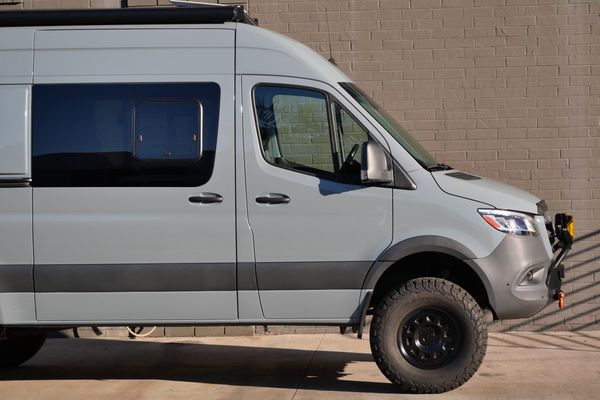 Silver 2022 Mercedes-Benz Sprinter 2500 4x4 custom camper conversion for sale by Sandbox Motors.