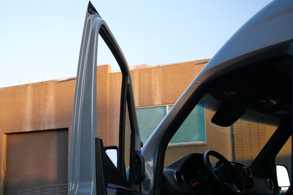 Silver 2022 Mercedes-Benz Sprinter 2500 4x4 custom camper conversion for sale by Sandbox Motors.