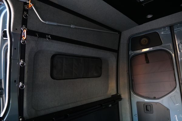 Silver 2022 Mercedes-Benz Sprinter 2500 4x4 custom camper conversion for sale by Sandbox Motors.