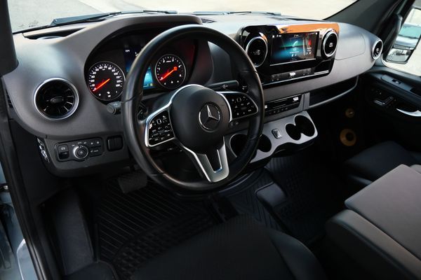 Silver 2022 Mercedes-Benz Sprinter 2500 4x4 custom camper conversion for sale by Sandbox Motors.