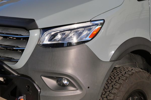 Silver 2022 Mercedes-Benz Sprinter 2500 4x4 custom camper conversion for sale by Sandbox Motors.