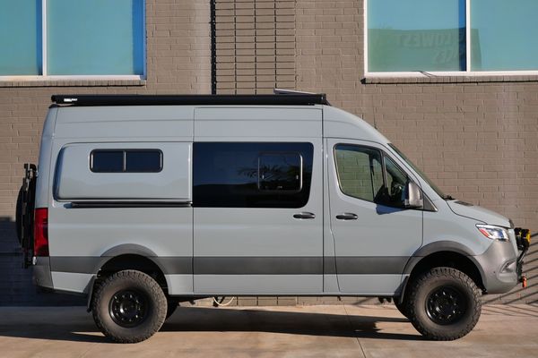 Silver 2022 Mercedes-Benz Sprinter 2500 4x4 custom camper conversion for sale by Sandbox Motors.