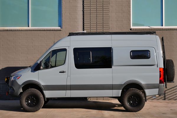 Silver 2022 Mercedes-Benz Sprinter 2500 4x4 custom camper conversion for sale by Sandbox Motors.