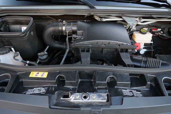 Silver 2022 Mercedes-Benz Sprinter 2500 4x4 custom camper conversion for sale by Sandbox Motors.