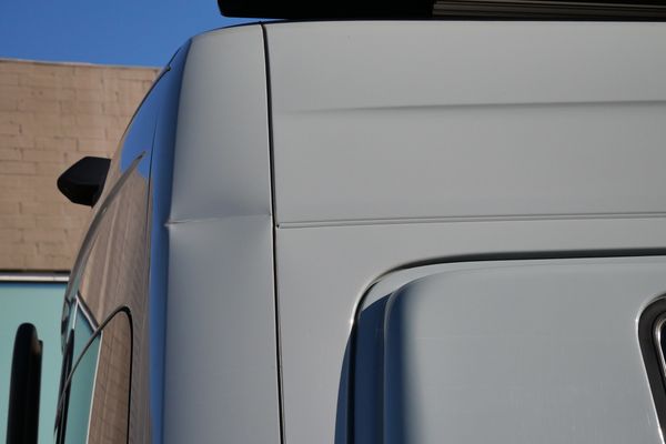 Silver 2022 Mercedes-Benz Sprinter 2500 4x4 custom camper conversion for sale by Sandbox Motors.