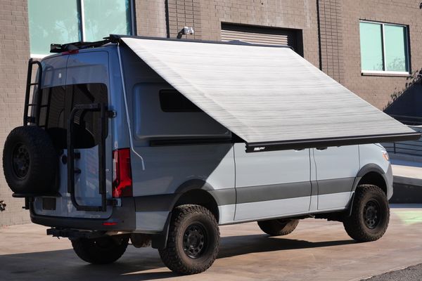 Silver 2022 Mercedes-Benz Sprinter 2500 4x4 custom camper conversion for sale by Sandbox Motors.