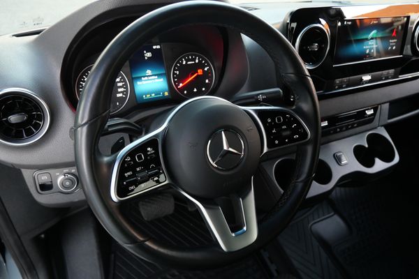 Silver 2022 Mercedes-Benz Sprinter 2500 4x4 custom camper conversion for sale by Sandbox Motors.