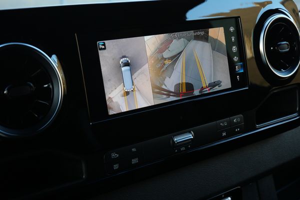 Silver 2022 Mercedes-Benz Sprinter 2500 4x4 custom camper conversion for sale by Sandbox Motors.