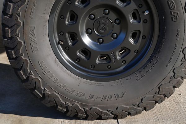 Silver 2022 Mercedes-Benz Sprinter 2500 4x4 custom camper conversion for sale by Sandbox Motors.